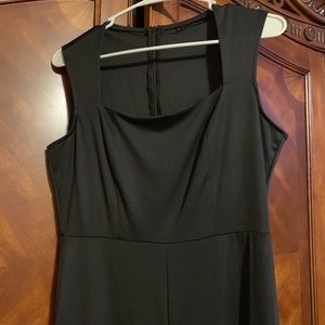 Full body, black jump suit